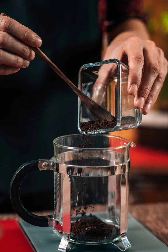 The Ultimate Guide to 12 Cup French Coffee Press Brewing 12 Measuring 75g coffee grounds for French press brewing