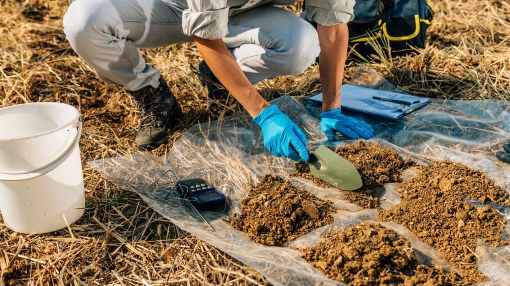 The Complete Coffee Farming Guide: From Soil Preparation to First Harvest 10 Coffee farming soil testing with digital pH meter and samples for coffee fields preparation