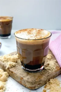 Homemade Starbucks Brown Sugar Oatmilk Cortado with blonde espresso, brown sugar syrup, and creamy oat milk in a glass