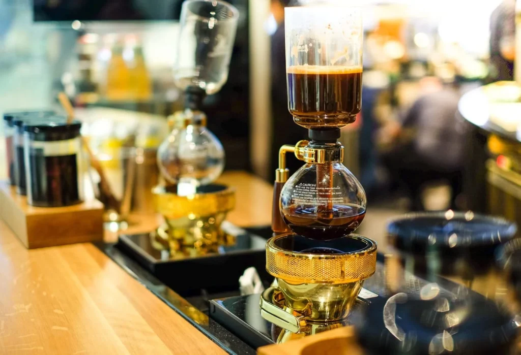 Immersion Coffee Brewing: Techniques, Equipment & Flavor Mastery 24 Syphon coffee maker using vacuum-pressure immersion brewing for tea-like clarity in the final cup